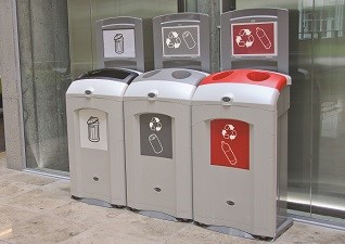 Nexus® 100 Indoor Recycling Bins for general waste, cans and plastic bottles, sited next to hospital elevator