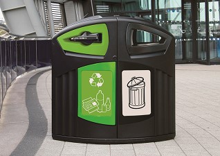 Nexus® 200 Outdoor Duo Recycling Bin for mixed recyclables and general waste, situated outside modern, glass building
