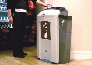 Nexus® 100 Cup Recycling Station with cup stacker and liquid reservoir with student inserting paper cup